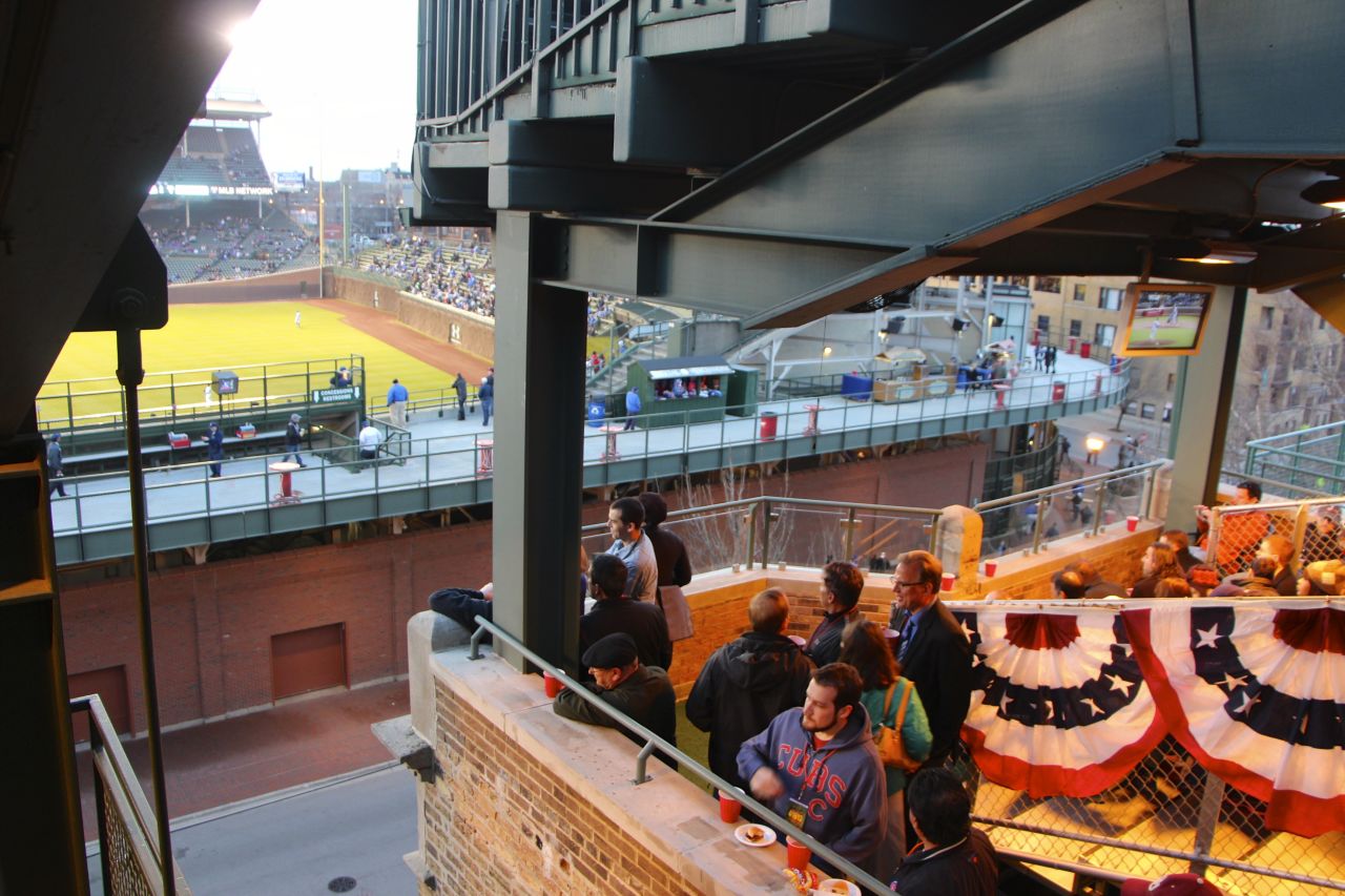 Rooftop bleachers across the street from Wrigley Field offer panoramic views of the game and the stadium. The businesses that operate the rooftops say the Chicago Cubs are contractually-bound the preserve the rooftops' views.  