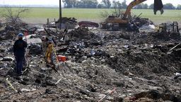 Forensic mappers work the crater at the site of a fire and explosion in West, Texas, on April 24, 2013. The West Fertilizer Co. plant in the small Texas town exploded days earlier on April 17, killing 15 people.