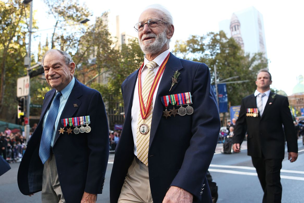 War veterans walk down George Street during the ANZAC Day parade on Thursday in Sydney, Australia.  