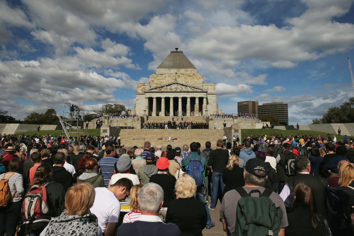 Crowds of people look on at the Shrine of Remembrance on Thursday in Melbourne, Australia. 