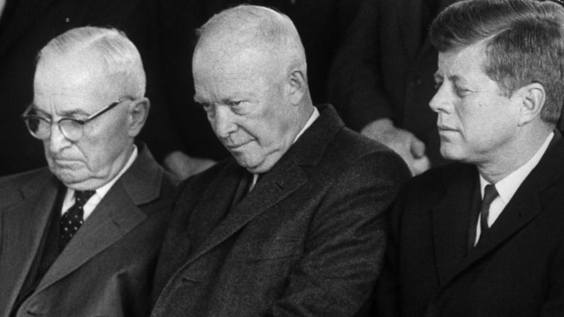 Harry S. Truman, Dwight D. Eisenhower and John F. Kennedy sit together at House Speaker Samuel Rayburn's funeral in November 1961.