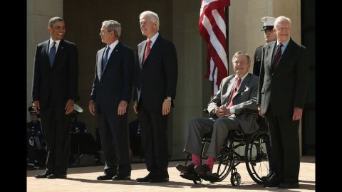 President Barack Obama and former presidents George W. Bush, Bill Clinton, George H.W. Bush and Jimmy Carter arrive on stage for the George W. Bush Presidential Center dedication ceremony.