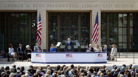 Former president George W. Bush, center, speaks to the crowd at the opening ceremony of the George W. Bush Presidential Center, flanked, left to right, by first lady Michelle Obama, President Barack Obama, former first lady Barbara Bush, former President George H.W. Bush, former first lady Laura Bush, former President Bill Clinton, former first lady Hillary Clinton, former President Jimmy Carter and former first lady Rosalynn Carter.