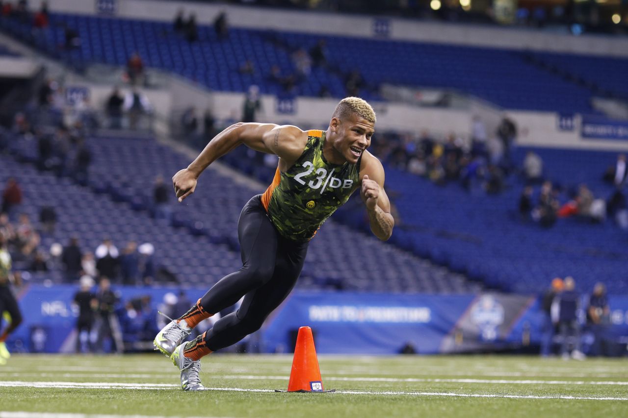 Cornerback Tyrann Mathieu, seen here training at the 2013 NFL scouting combine, was cut from Louisiana State University's football program last year for violating team rules, and was later arrested for possessing marijuana. The 20-year-old <a href="http://www.usatoday.com/story/sports/nfl/2013/02/24/tyrann-mathieu-combine/1943001/" target="_blank" target="_blank">says he wants a fresh start in the draft.</a>