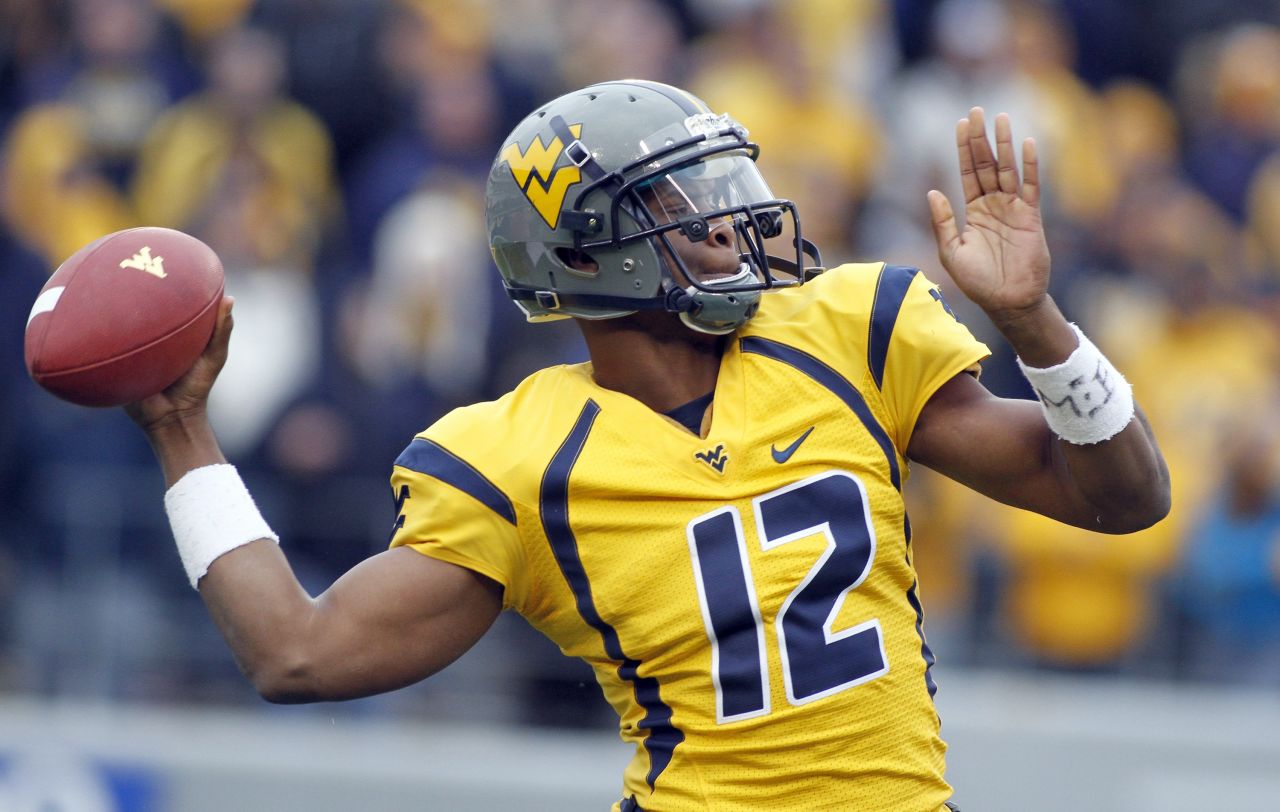 West Viriginia's Geno Smith has been <a href="http://bleacherreport.com/articles/1599736-geno-smith-5-things-you-need-to-know-about-the-west-virginia-qb" target="_blank" target="_blank">tipped by some as the best quarterback in the draft. </a>Last year he broke the Mountaineers' consecutive pass completions record and <a href="http://www.big12sports.com/ViewArticle.dbml?DB_OEM_ID=10410&ATCLID=205819874" target="_blank" target="_blank">tied the NCAA completion percentage record.</a>