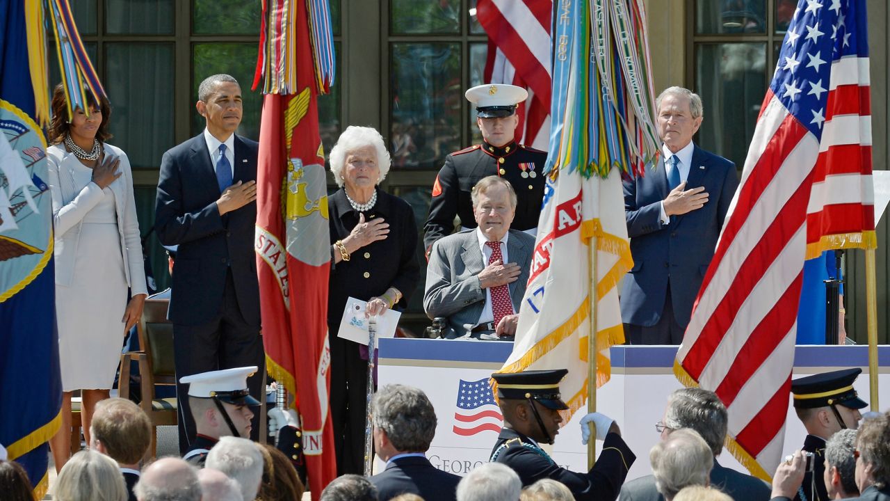 First lady Michelle Obama, President Barack Obama, former first lady Barbara Bush, former President George H.W. Bush and former President George W. Bush attend the opening ceremony of the George W. Bush Presidential Center on Thursday, April 25, 2013 in Dallas. Republicans and Democrats alike and world leaders were in attendance during the official dedication of the facility.