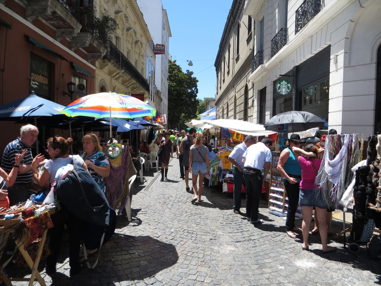 A Sunday market in Buenos Aires. The city has many cafes, and the culture is such that people take time to sit down for coffee, says psychologist Albert Brok. Starbucks has also made its way there. 
