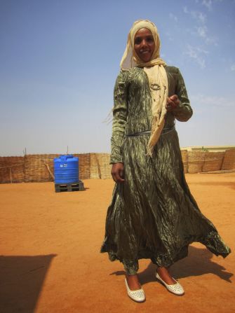 He describes the way women in Darfur dress as "colorful, unique, proud and fashionable."