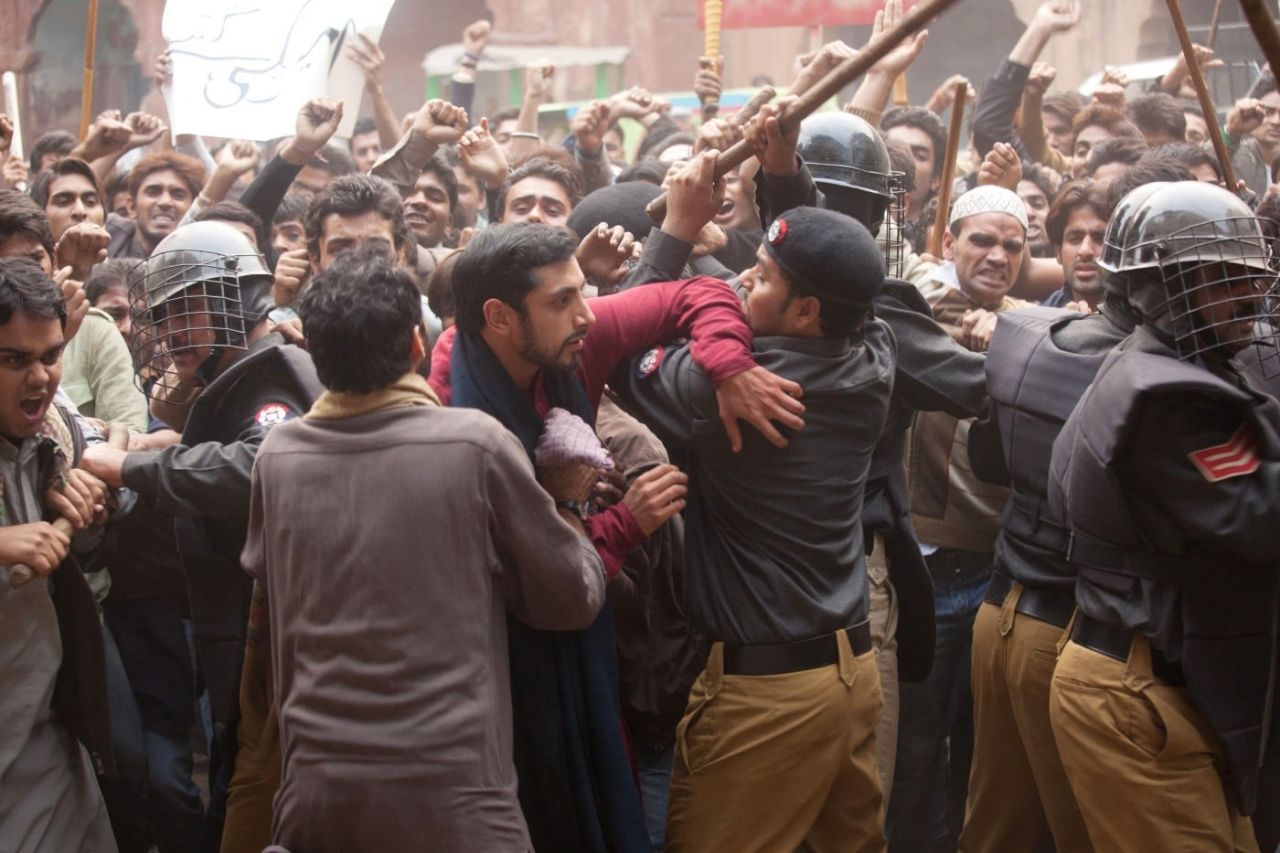 <strong>"The Reluctant Fundamentalist" (2012)</strong>: "Riz" Ahmed, a.k.a. Riz MC (in red), stars as a Pakistani man caught up in post-9/11 intrigue in this political thriller. <strong>(Netflix) </strong>