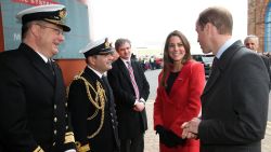 BARROW-IN-FURNESS, UNITED KINGDOM - APRIL 05:  Prince William, Earl of Strahearn and Catherine, Countess of Strathearn are greeted by Rear-Admiral Simon Robert Lister and Commander Steve Garrett as they visit the Astute-class Submarine Building at BAE Systems on April 5, 2013 in Barrow-in-Furness, United Kingdom. The Duke of Cambridge is Commodore-in-Chief of the Royal Navy Submarine Service and during their visit they will tour the offices of Vanguard replacement programme and meet with the crew of Artful and their families, who are now based in Barrow.  (Photo by Chris Jackson-Pool/Getty Images)