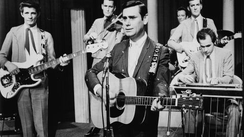 Jones performs with his band on stage for the film, 'From Nashville With Music,' in 1969.