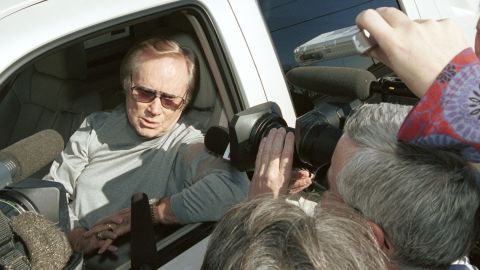 Jones talks with reporters in Nashville before greeting protesters who were rallying in front of WSM Radio studios against radio format changes in January 2002.