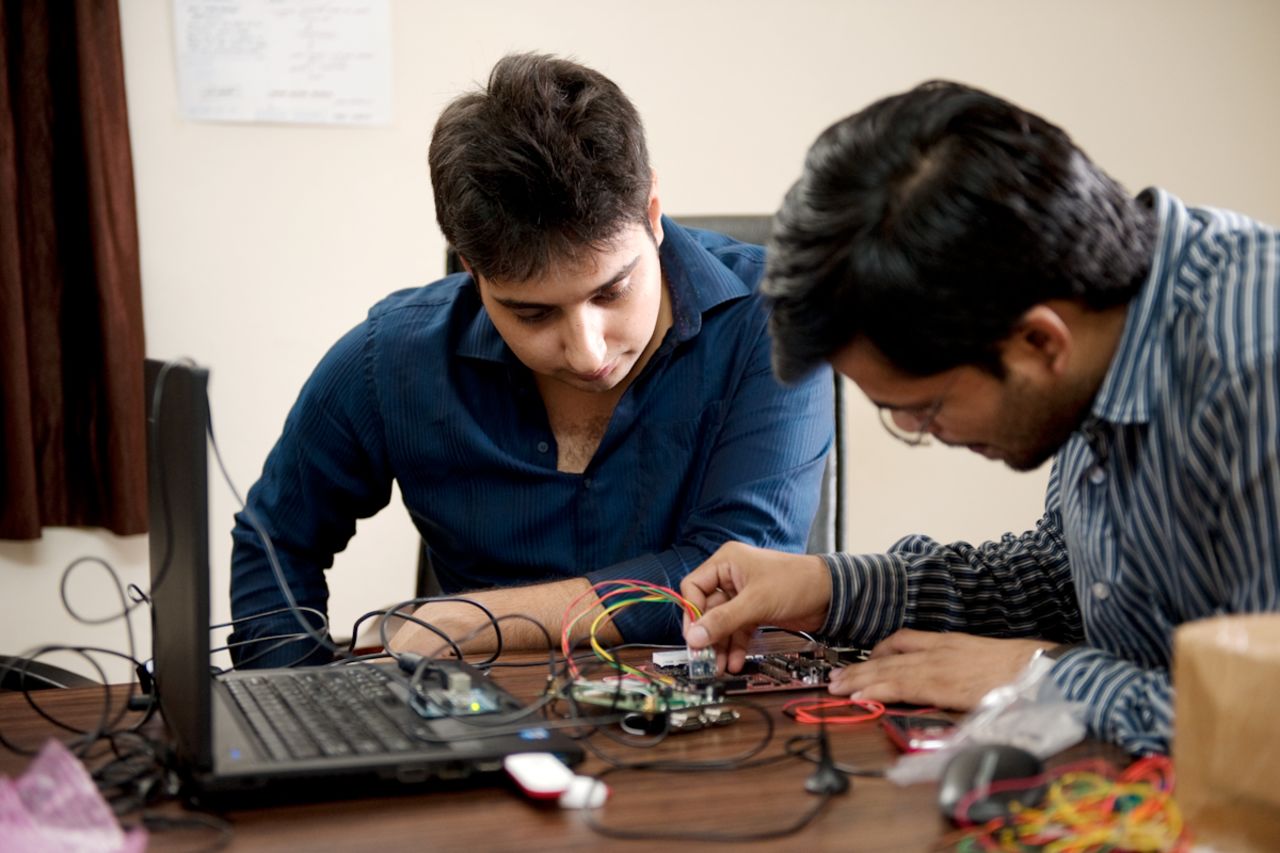 Dagar (center) has described his creation as "a companion more than a phone."