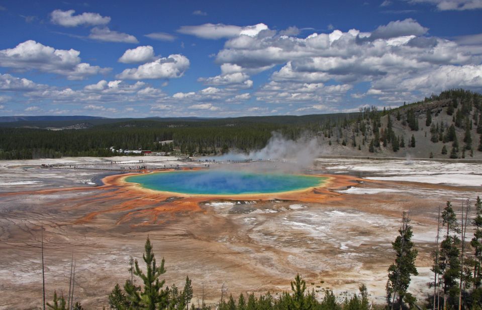 Grand Prismatic Spring is one of the most fascinating spots at Yellowstone, which has an abundance of intriguing spots to explore. It's in Midway Geyser Basin, about 5 miles from Old Faithful. Sometimes, you can see the steam change colors because of the spring's bacteria.