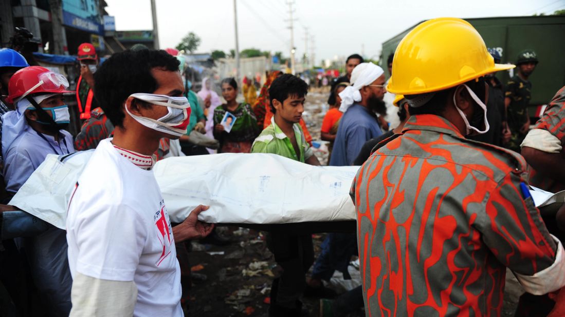 Rescue workers carry a victim's body recovered from the rubble on April 28.