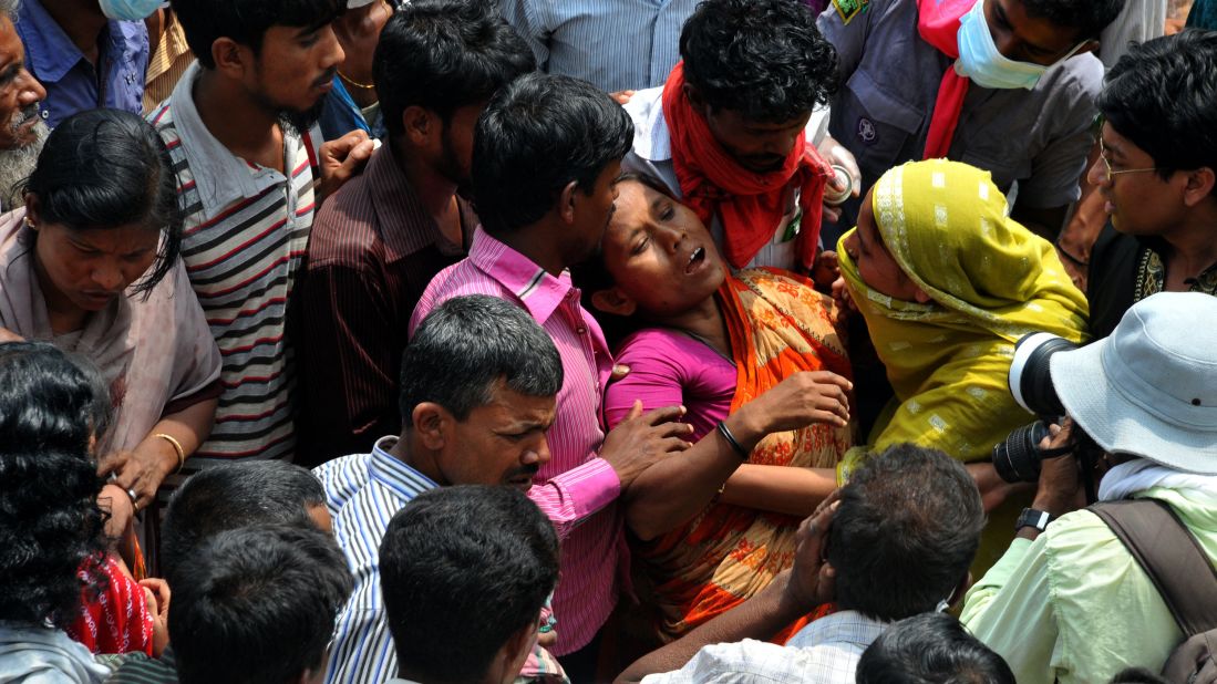 A woman mourns on April 28 at the site of the building collapse in Savar. 