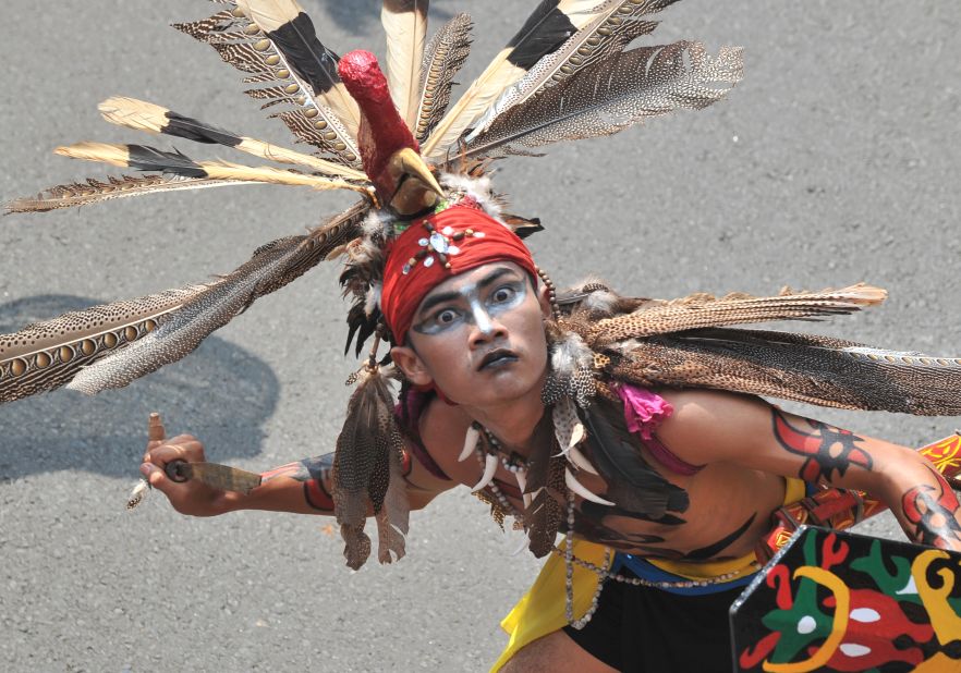 An ethnic Dayak man from Central Kalimantan dances during the Dayak Festival in Jakarta, Indonesia on April 28. 