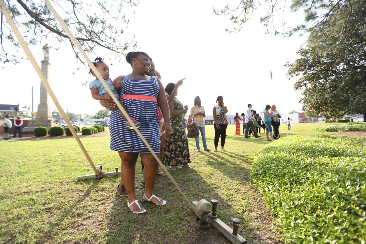 Family and friends traditionally gather outside Wilcox County students' proms to take photos and see them on their "senior walk," when their plans for the future are announced. More than 150 people gathered to watch the nearly 100 students at the integrated prom in 2013.