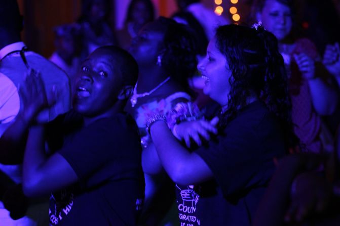 Students at the 2013 prom received T-shirts celebrating the class of 2013 and commemorating their first racially integrated prom. By the end of the night, most students had kicked off their dress shoes and popped on their T-shirts.