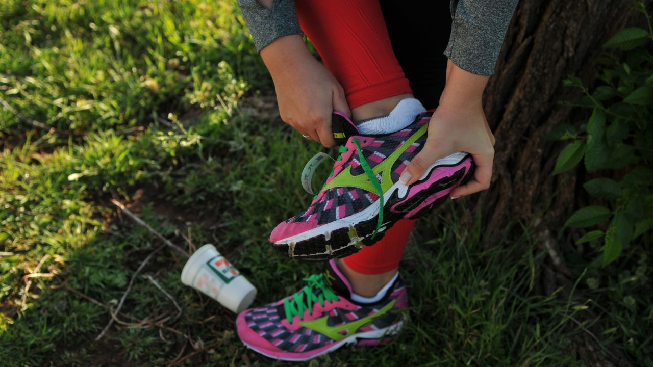 Runners at the Oklahoma City Memorial Marathon wore red socks and leggings in honor of Boston. Green shoe laces honored Oklahoma City.