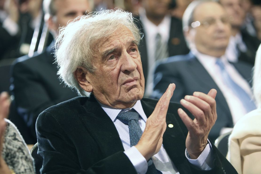 Elie Wiesel claps as President Barack Obama speaks at the Holocaust Museum in 2012 in Washington. 