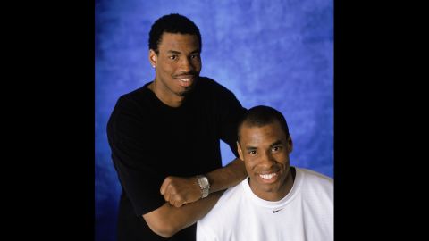 Collins and his twin brother, Jarron, pose for a portrait during the 2004 NBA All-Star Weekend. 