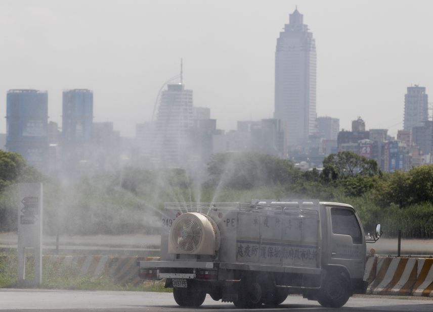 A New Taipei City Department of Environmental Protection truck sprays a virus disinfectant in a park on April 29. 
