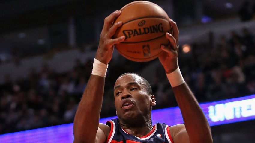 CHICAGO, IL - APRIL 17: Jason Collins #98 of the Washington Wizards rebounds against the Chicago Bulls at the United Center on April 17, 2013 in Chicago, Illinois. The Bulls defeated the Wizards 95-92. NOTE TO USER: User expressly acknowledges and agrees that, by downloading and or using this photograph, User is consenting to the terms and conditions of the Getty Images License Agreement.  (Photo by Jonathan Daniel/Getty Images) *** Local Caption *** Jason Collins