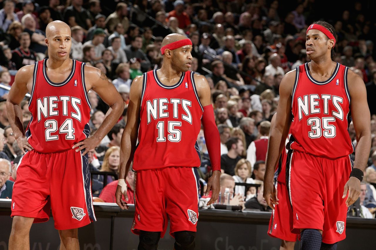 From left, Richard Jefferson, Vince Carter and Collins walk across the court during a 2007 game against the Portland Trail Blazers on in Portland, Oregon.