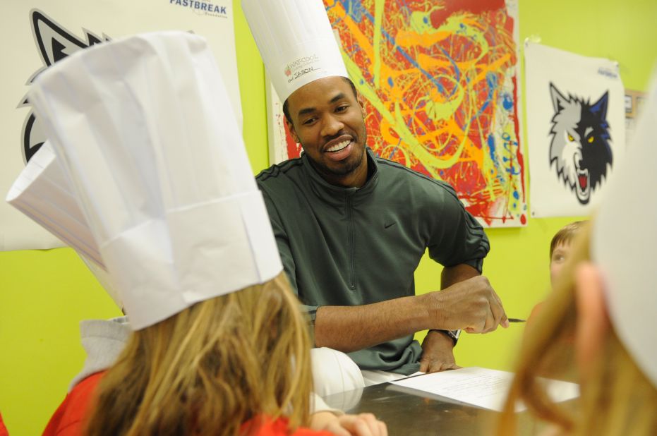 Collins, then with the Minnesota Timberwolves, helps children with diabetes prepare meals at Way Cool Cooking School in Eden Prairie, Minnesota, in 2009. He played for the Timberwolves during the 2008-09 season.
