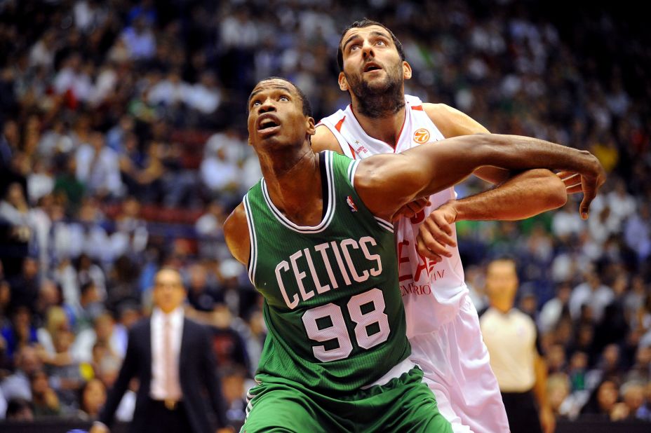 Collins competes with Ioannis Bourousis of Armani during the NBA Europe Live game in 2012 in Milan, Italy.