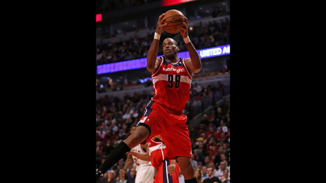 Collins, with the Washington Wizards, rebounds against the Chicago Bulls this year in Chicago. The center is now a free agent.