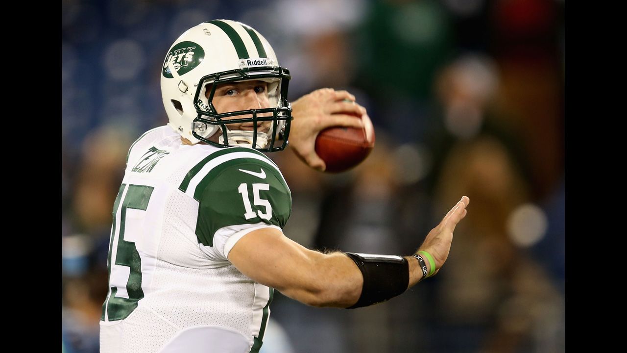Tebow warms up before the Jets' game against Tennessee in December 2012.