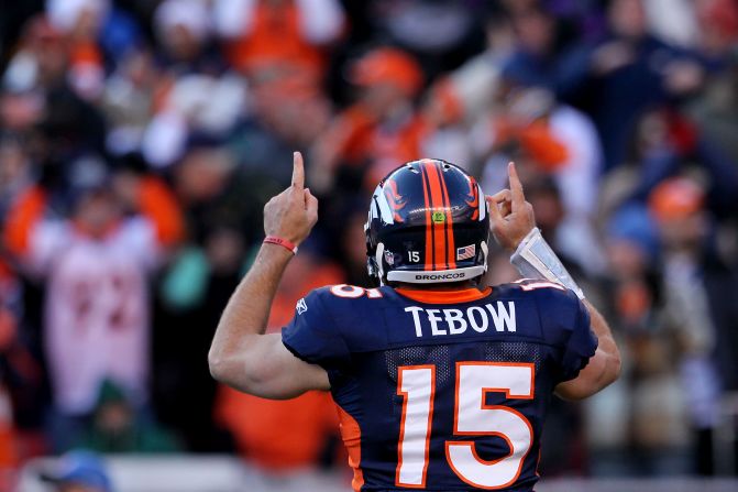 Tebow celebrates after running for a touchdown during the Broncos' playoff win against Pittsburgh in January 2012. The Broncos defeated the Steelers 29-23 in overtime.