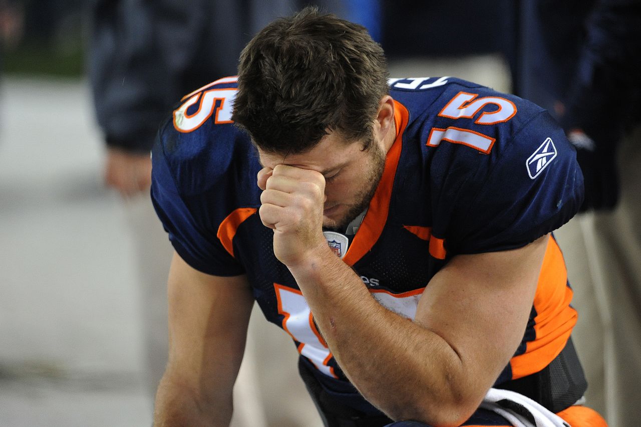 Tebow prays during the final minute of a game in November 2011. The pose, which often came after touchdowns, came to be known as "Tebowing."