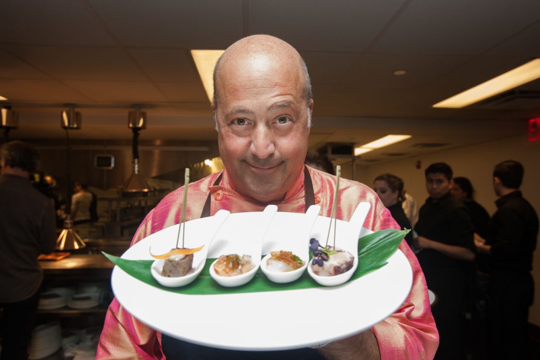 Zimmern prepares food for guests at the SUS fundraising dinner