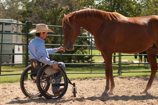 Horsemanship teacher Michael Richardson demonstrates the sensitivity and responsiveness of Santo, a former track horse at LOPE.