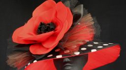 Sally Steinmann has never owned a horse, but her heart is full of love for them. Now, she creates hats in honor of retired racehorses at Old Friends. A hat is auctioned off to benefit their welfare each month for six months, leading up to the Kentucky Derby. Pictured here is a hat designed in honor of retiree Popcorn Deelites.