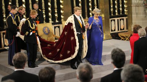 King Willem-Alexander and Queen Maxima prepare to leave after their investiture ceremony at New Church on April 30 in Amsterdam.