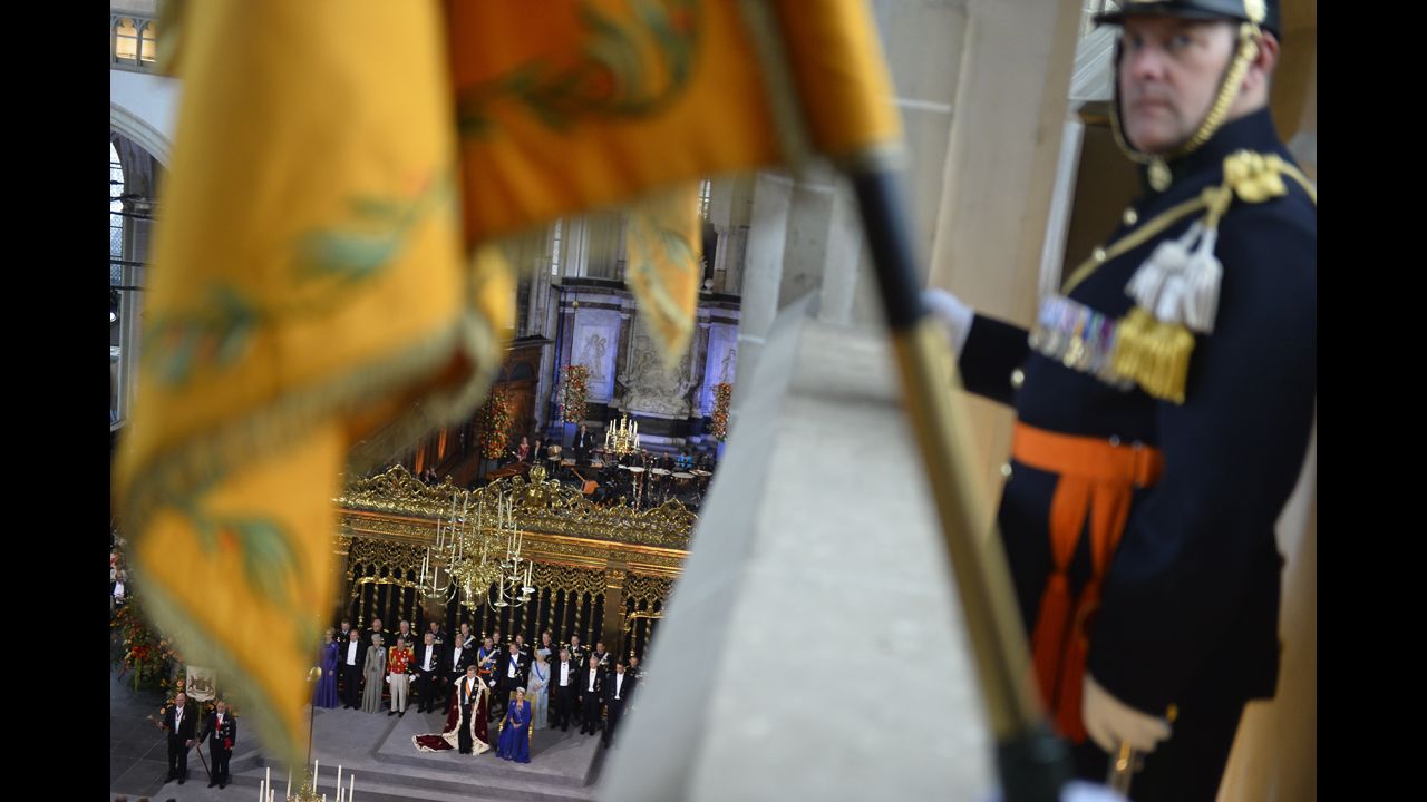 Dutch King Willem-Alexander, Queen Maxima and members of the royal household take part in the investiture ceremony.