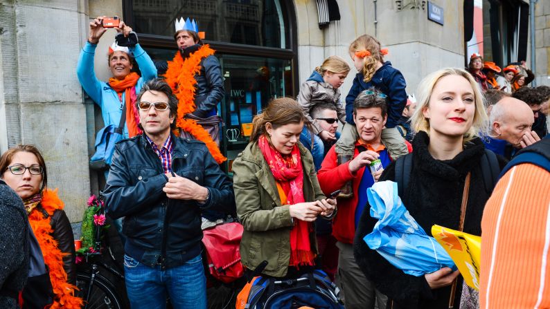 The crowd watches investiture celebrations in Amsterdam.