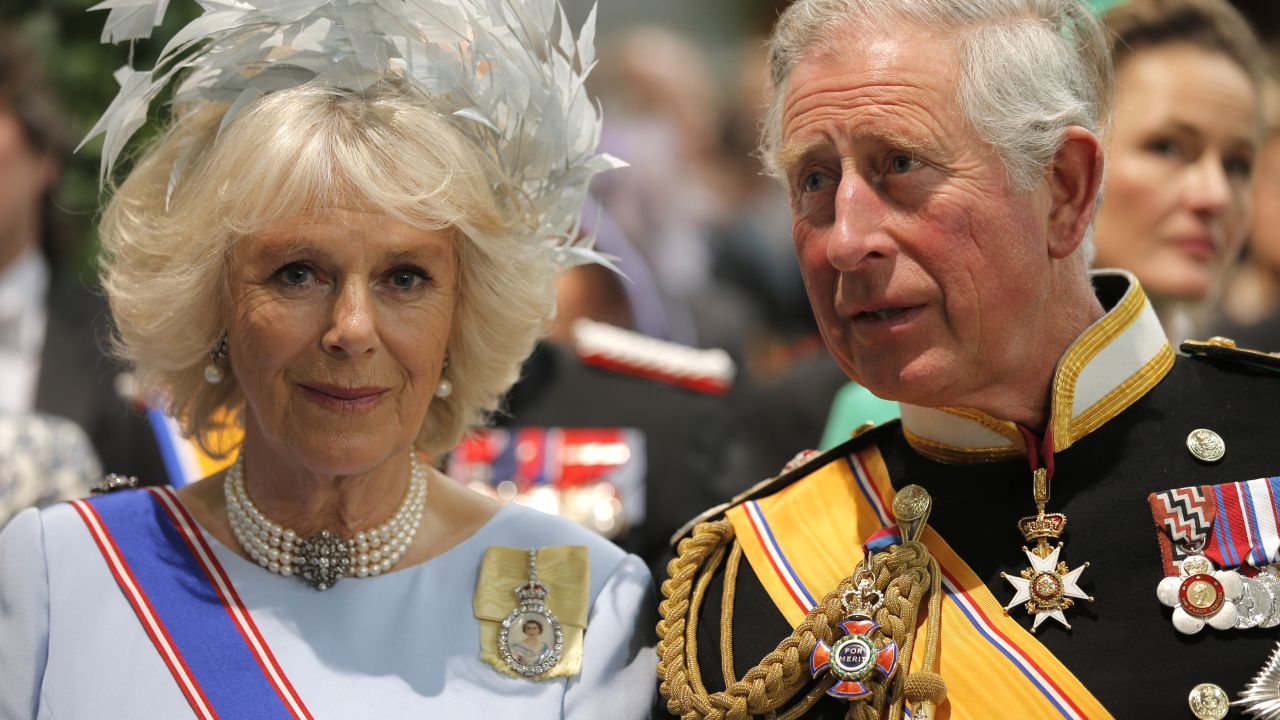 Prince Charles, Prince of Wales and Camilla, Duchess of Cornwall, attend the investiture ceremony.