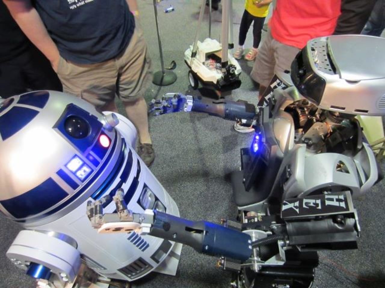 HEX meets "R2-D2" at a recent Robofest event. Haygood hopes to inspire kids in Baltimore to build robots. 