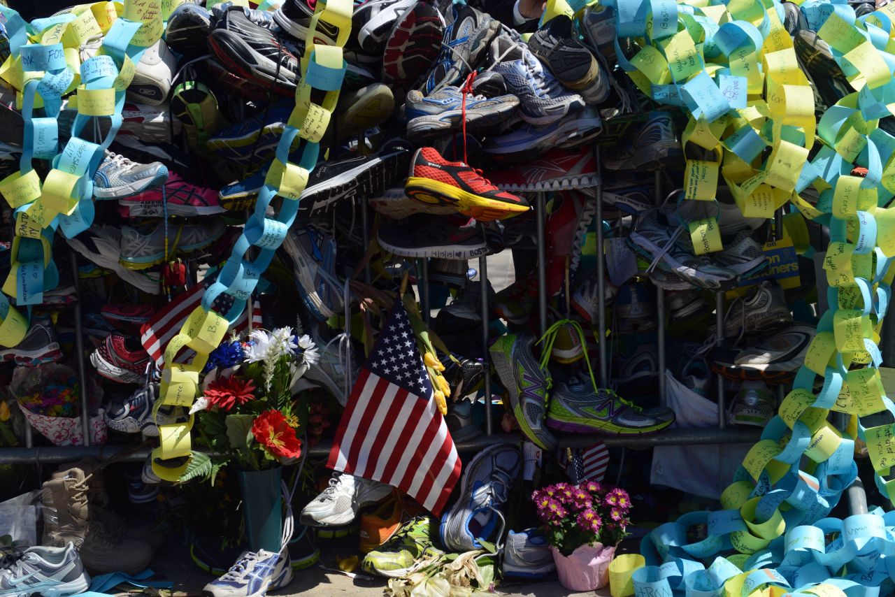 Running shoes were among the mementos left as a tribute to the bombing victims.