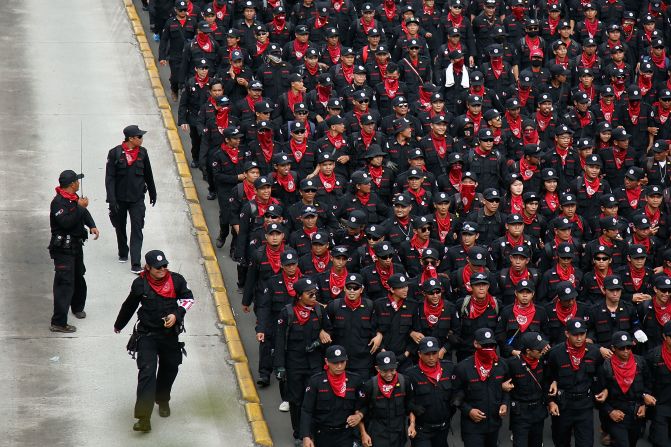 Tens of thousands of workers and labor activists march through the central business district in Jakarta, Indonesia.