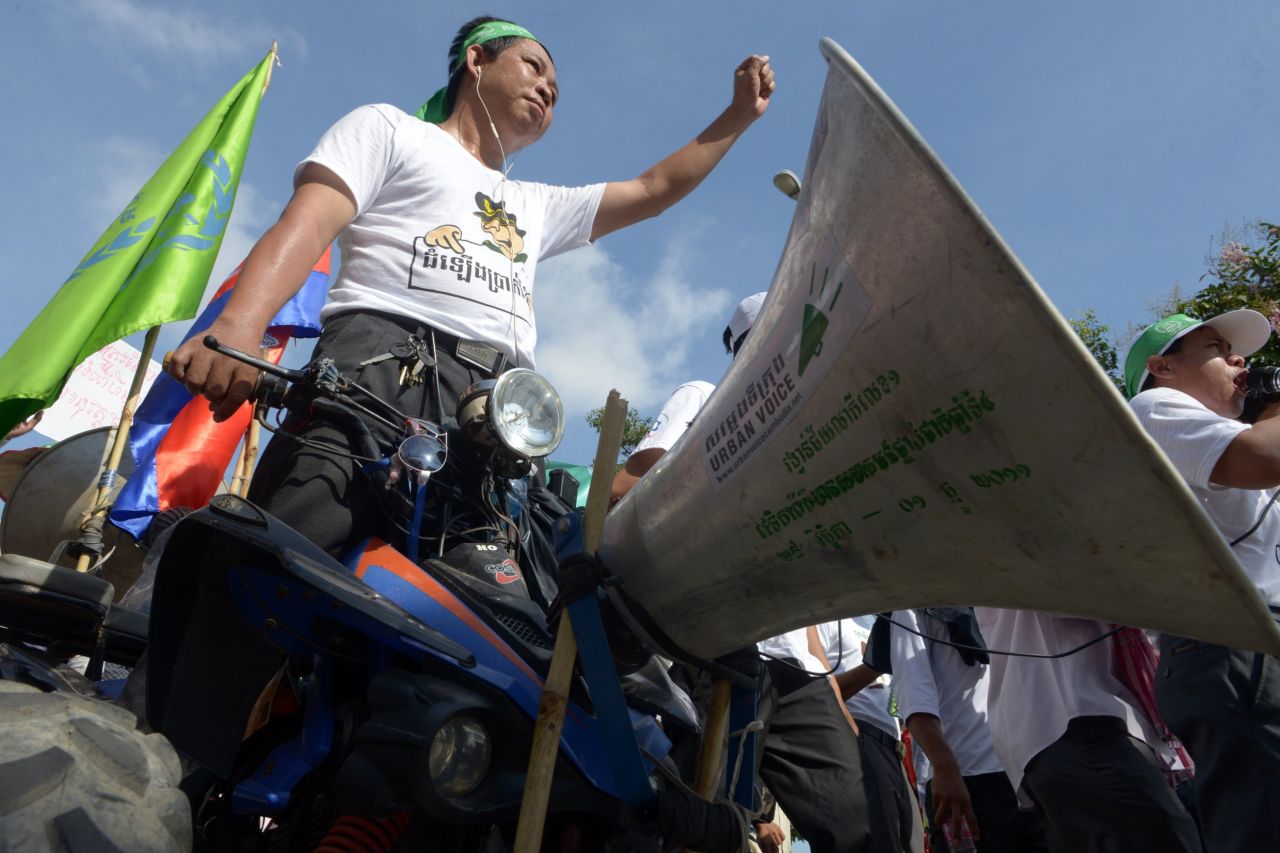 A Cambodian worker stands on a vehicle as he attends a May Day protest in Phnom Penh.