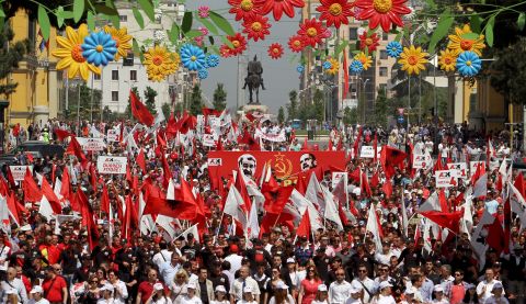 Supporters of the nationalist party Red and Black march in Tirana, Albania, demand the resignation of Premier Sali Berisha.