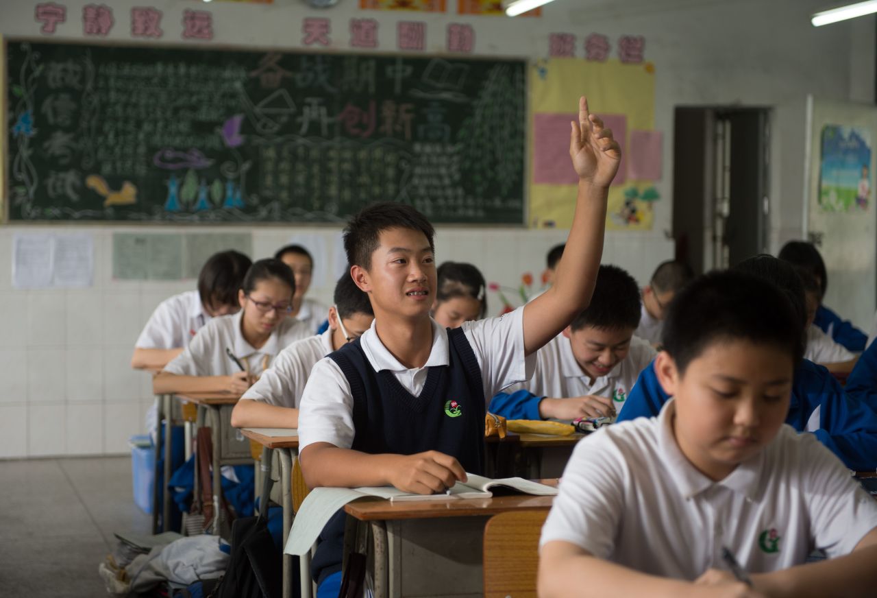 The schoolboy juggles his studies at Dongguan Middle School in Guangdong Province with his golfing career.
