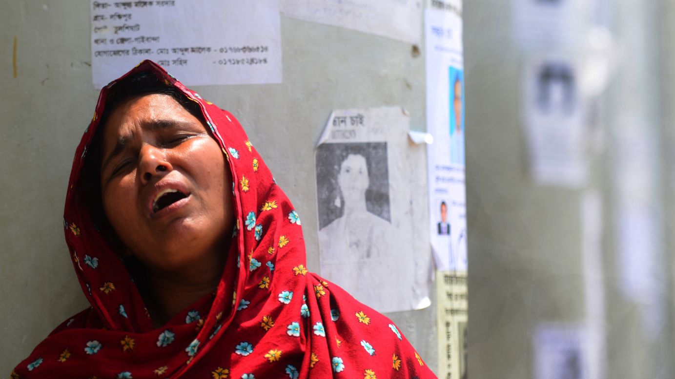 A woman weeps after identifying her daughter's body in the rubble in Savar on May 2.