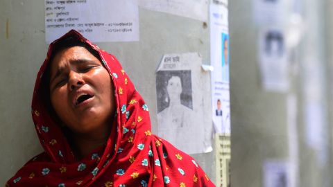 A woman weeps after identifying her daughter's body in the rubble in Savar on May 2.